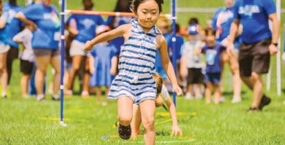 Little girl compteting in a race.