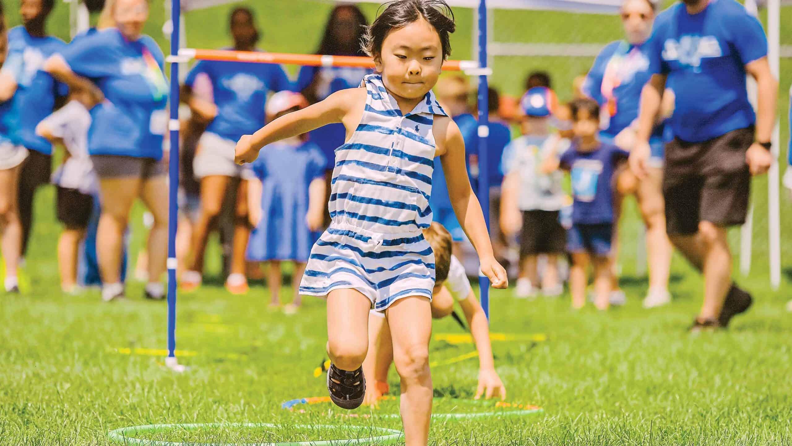Little girl compteting in a race.